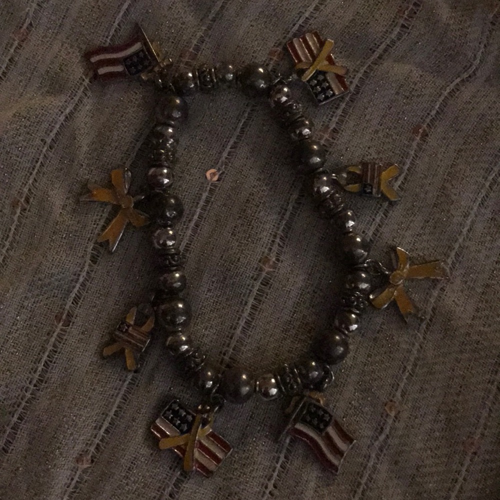 Heavy bracelet with charms